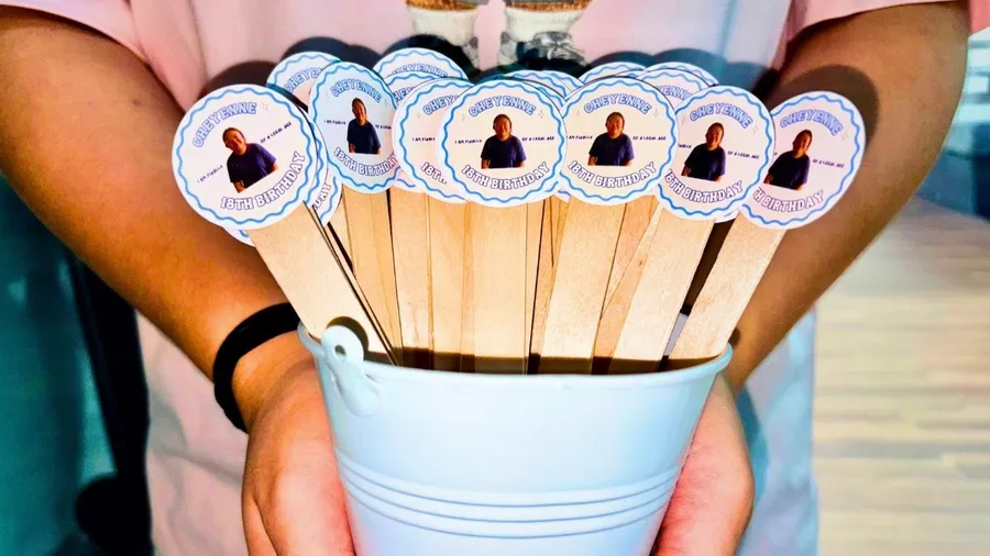 Waffle wands wrapped as a bouquet in a blue bucket
