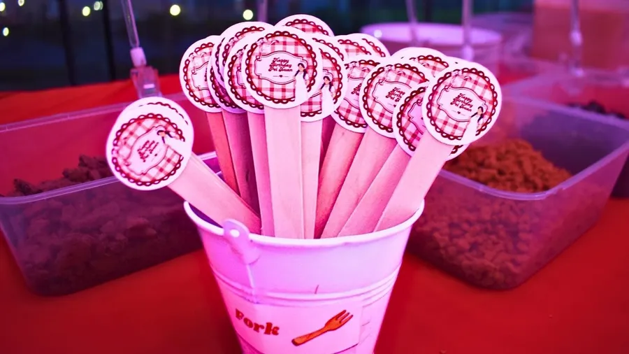 Waffle wands wrapped as a bouquet in a pink bucket